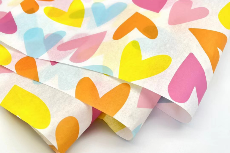 Rose-colored tissue paper with logo print