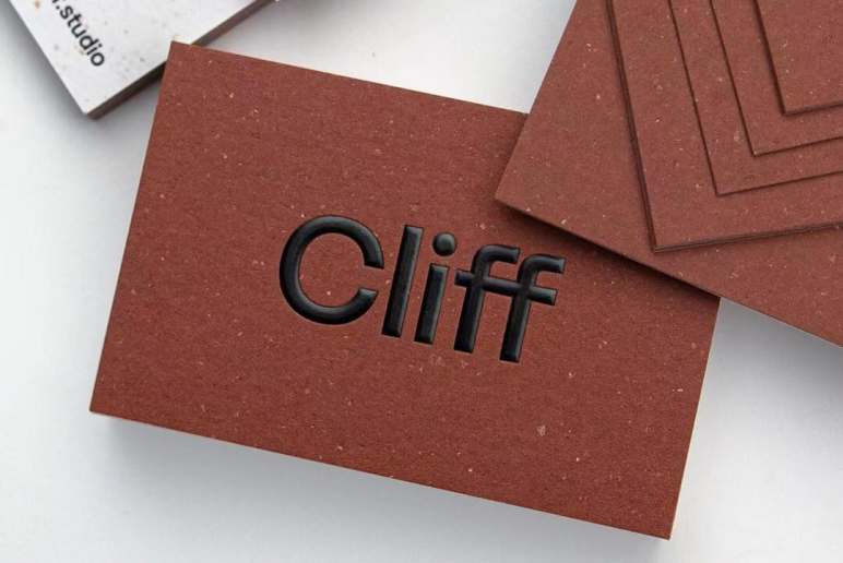 Custom die-cut hang tag with unique brand silhouette