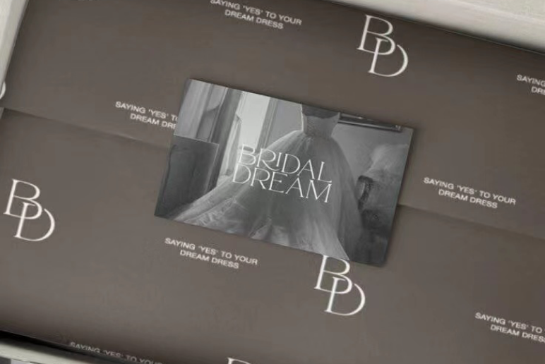 Black branded packaging with custom tissue paper insert