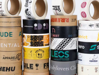Assorted custom printed kraft paper and BOPP packaging tape rolls