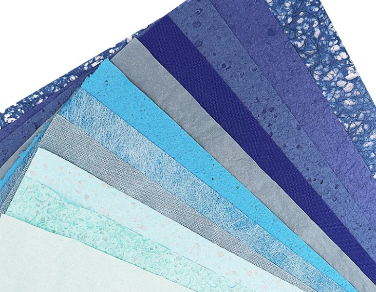 Rolled printed tissue paper samples in assorted patterns