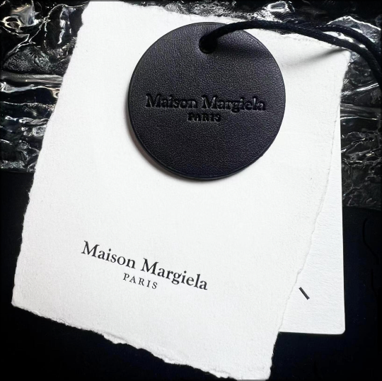 Custom leather tag detail