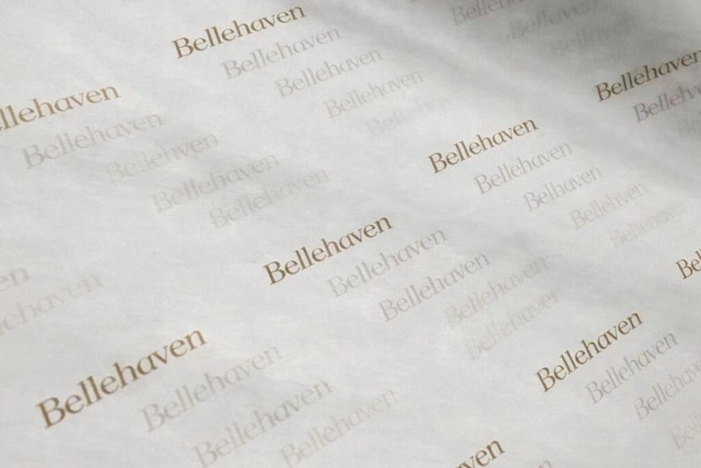 Custom tissue paper with repeating gold script print