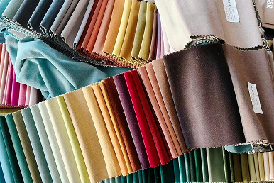 Colorful satin fabric swatches for custom drawstring pouches and premium gift packaging
