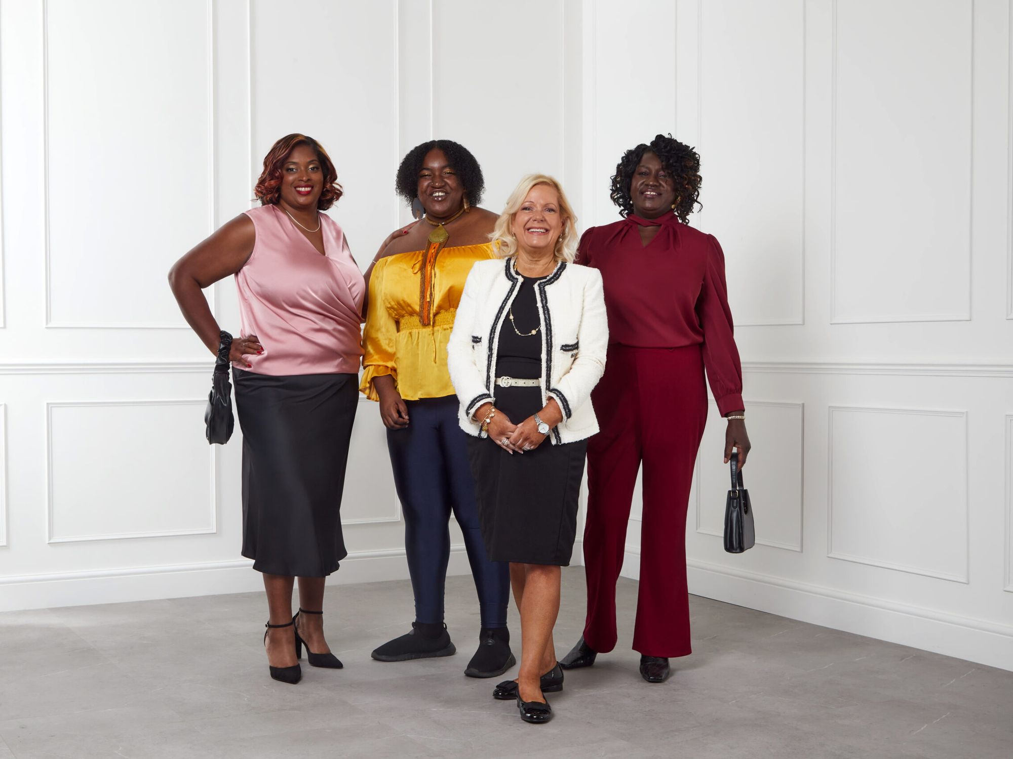 Four women posing for a picture