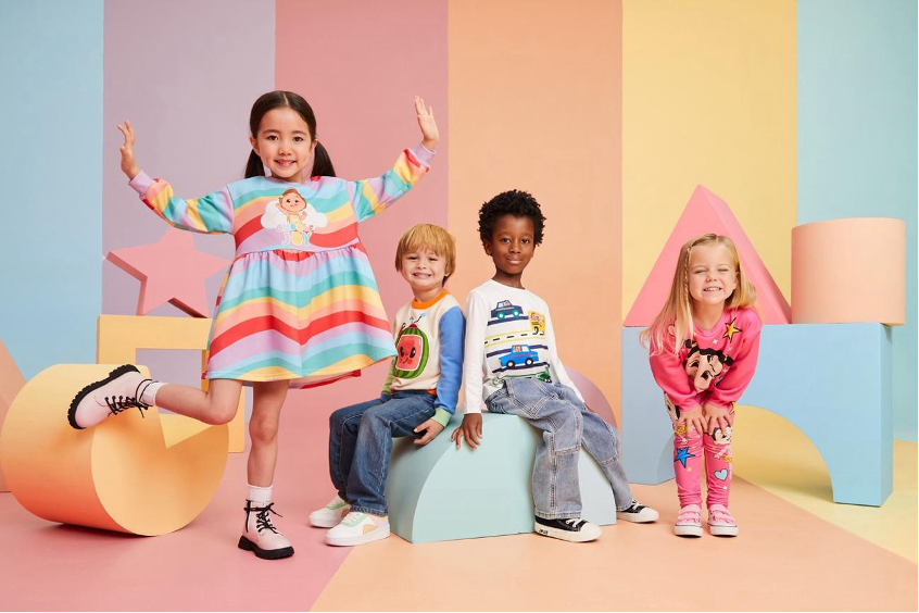 Four children posing for a photoshoot