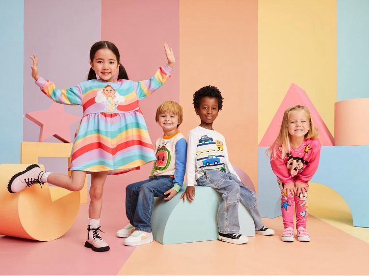 Four children posing for a photoshoot