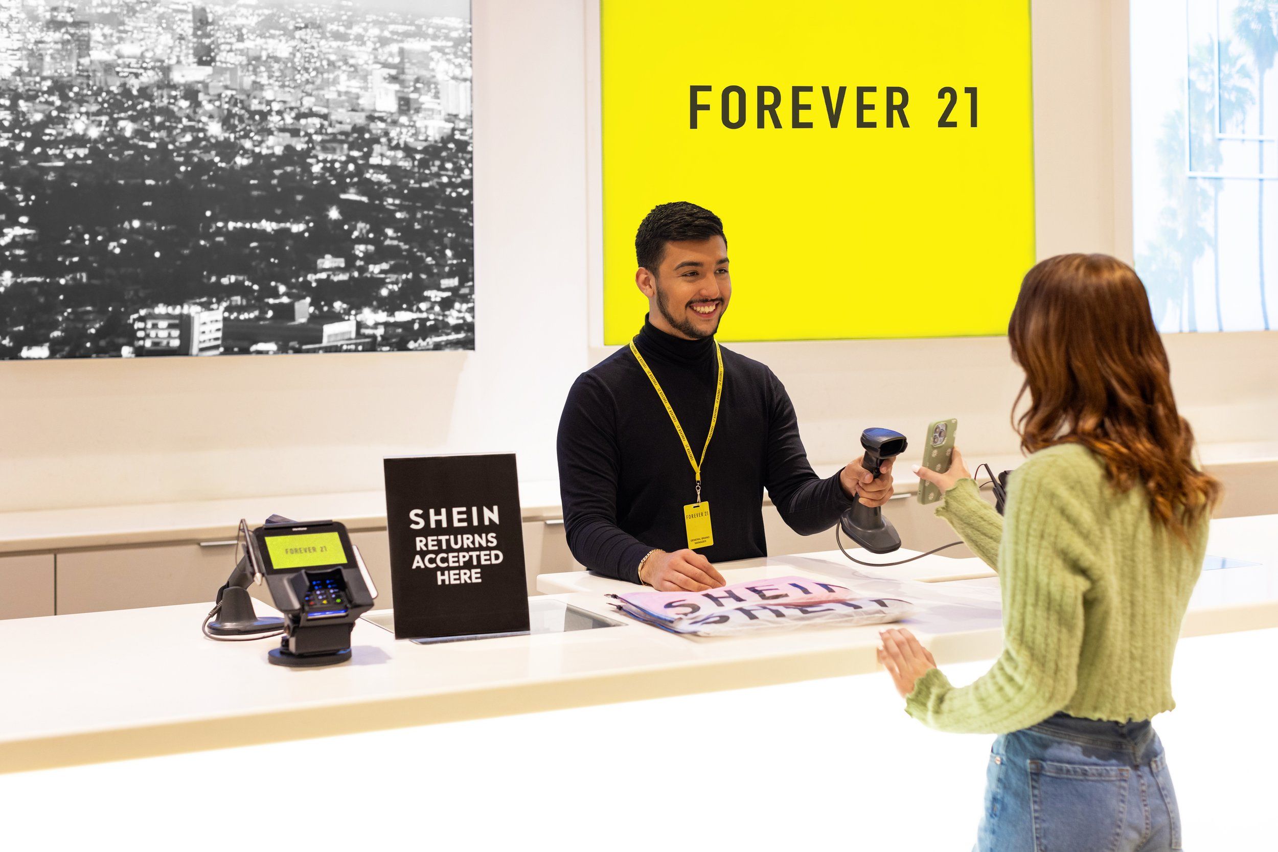 A cashier and a customer making a return