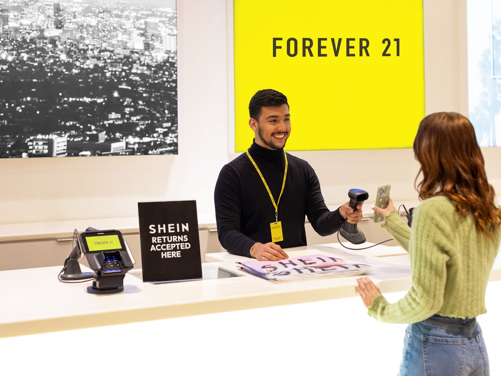 A cashier and a customer making a return