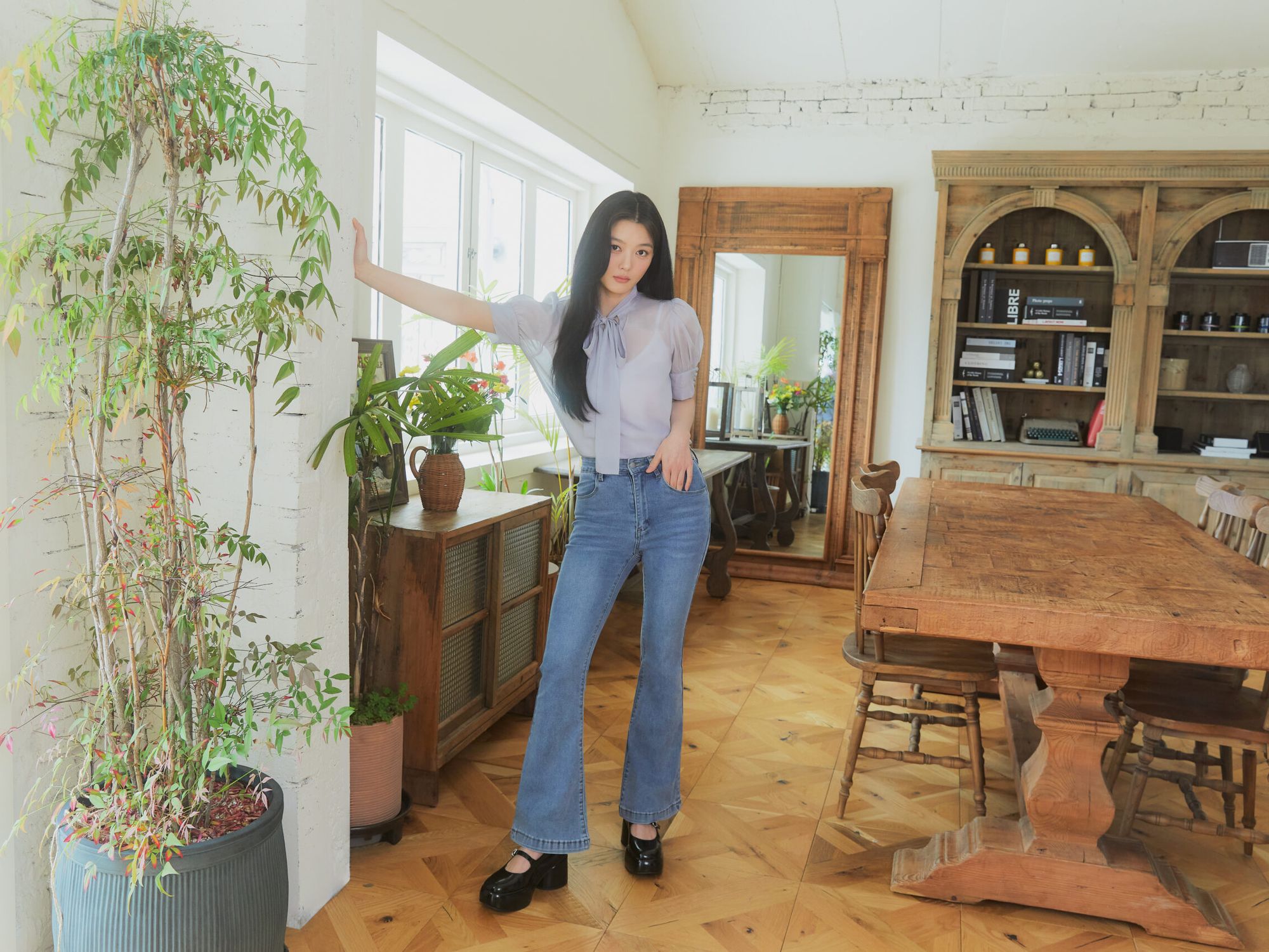 Kim You-Jung posing in a room