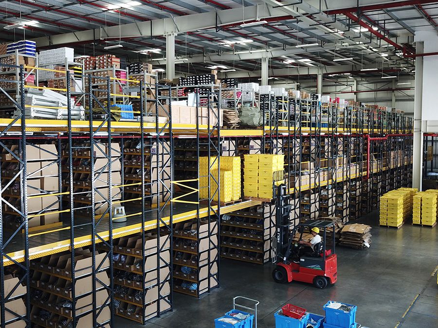 Warehouse interior with shelves full of boxes and products