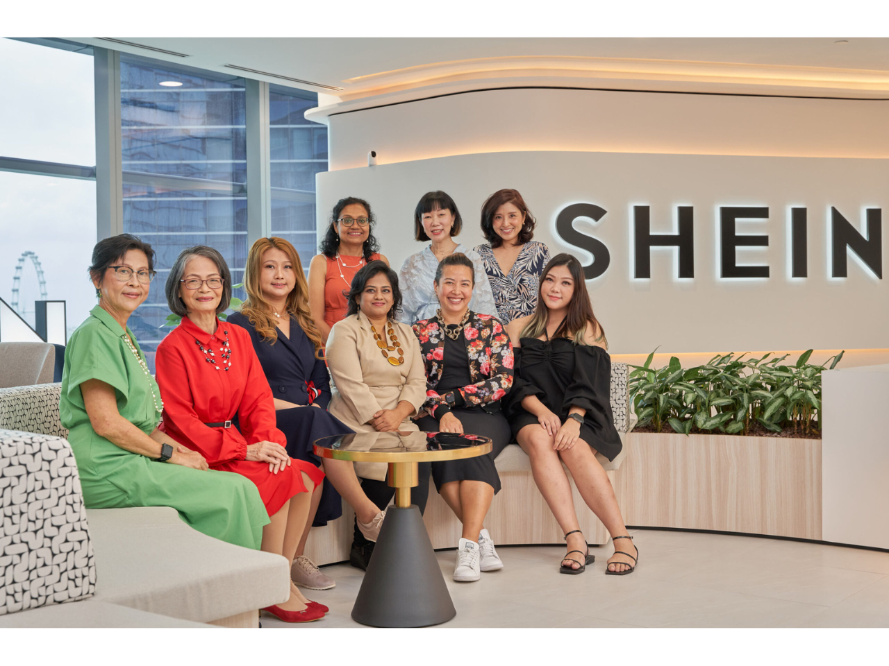 A group of women posing for a photo
