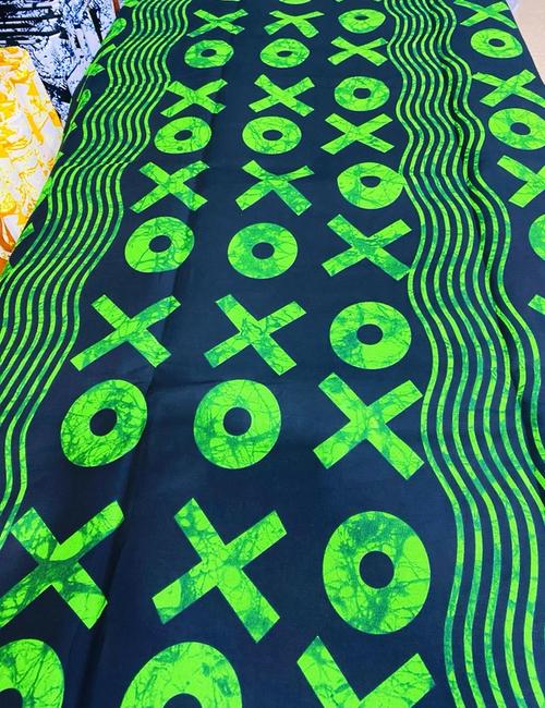 Green and black xo with lines 
