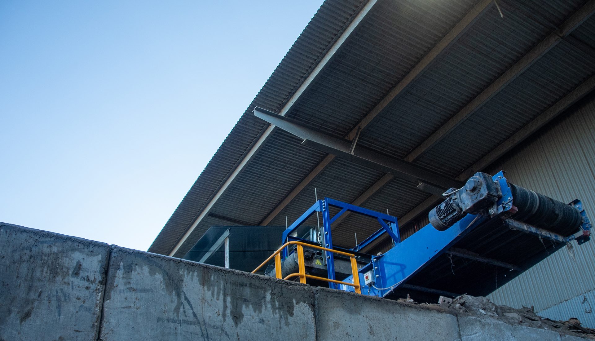 Elevated conveyor and screening plant against the sky