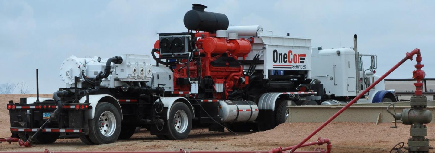 OneCor 2,250 HP pump unit rigged up near a wellhead