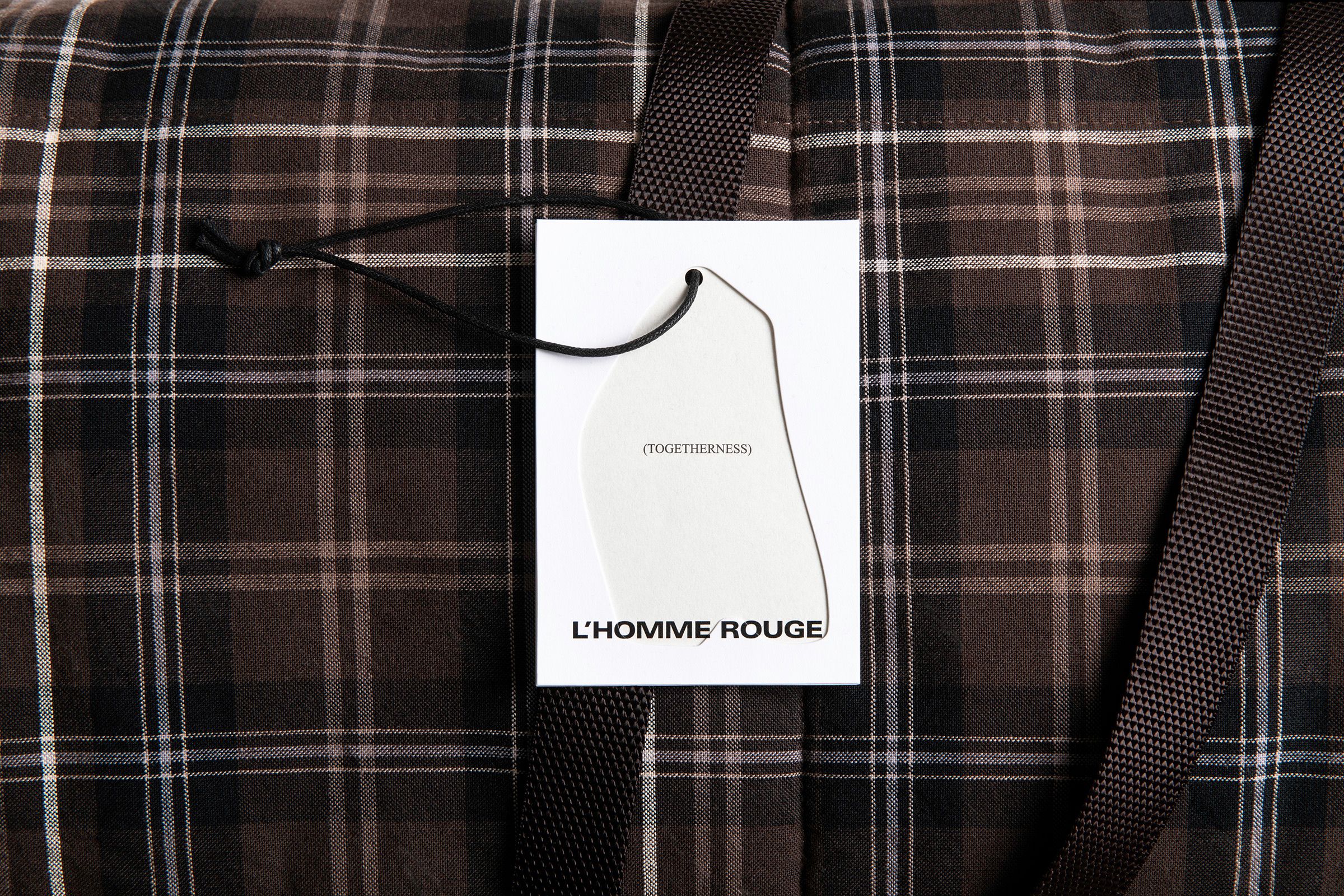 L'HOMME ROUGE Hangtag