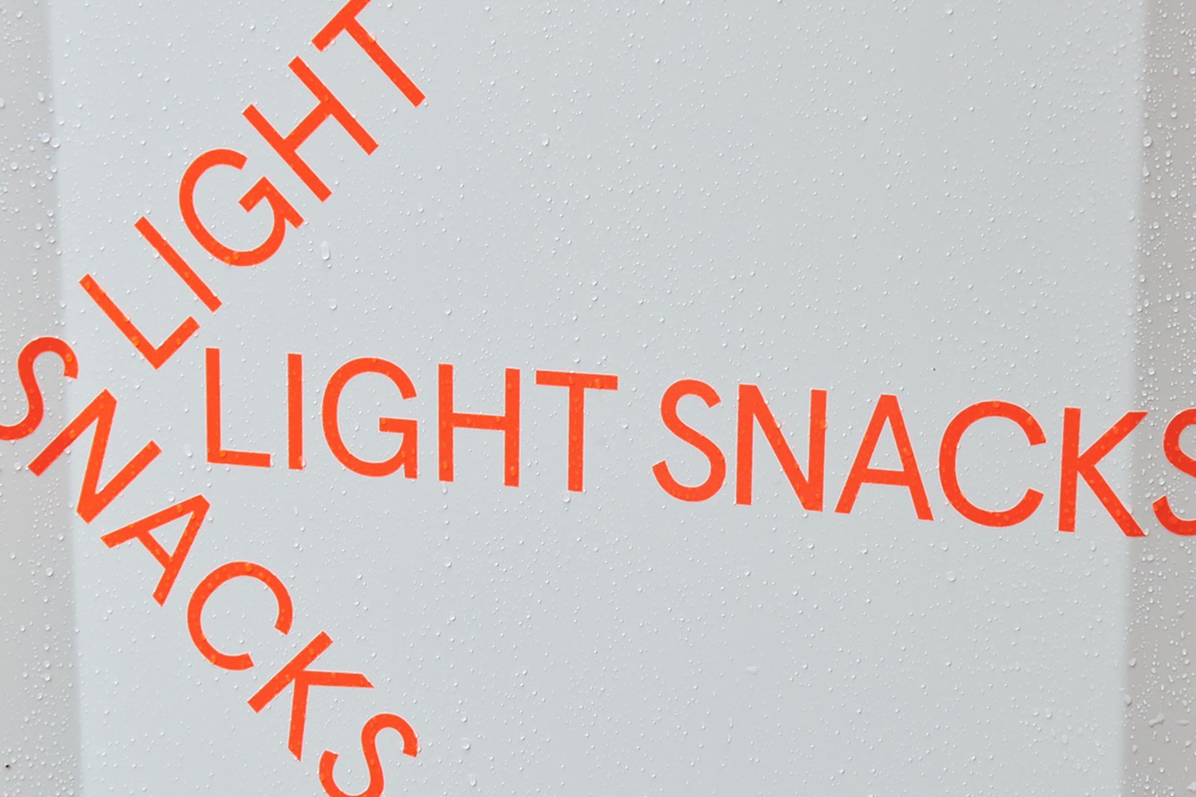 FLOS LIGHT SNACKS Sign