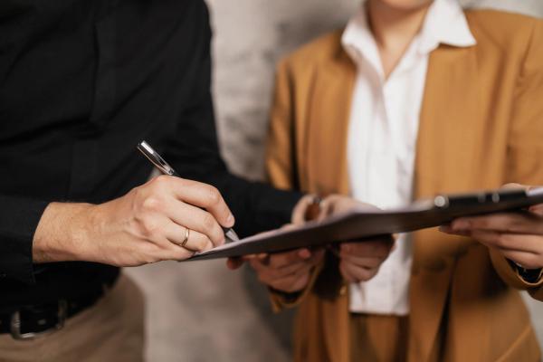 person holding a clipboard 