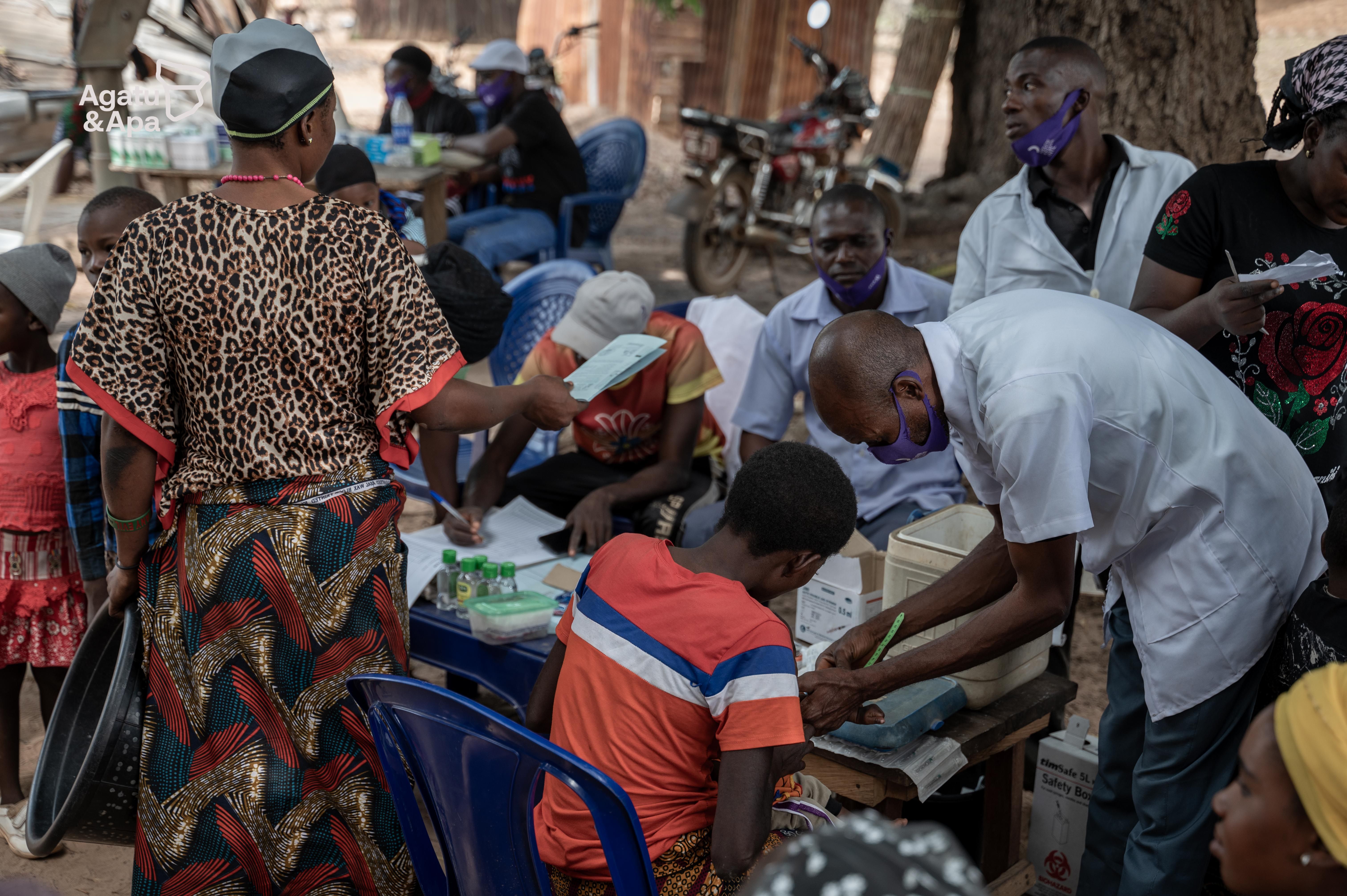 Our medical volunteers working tirelessly to attend to patients one by one.