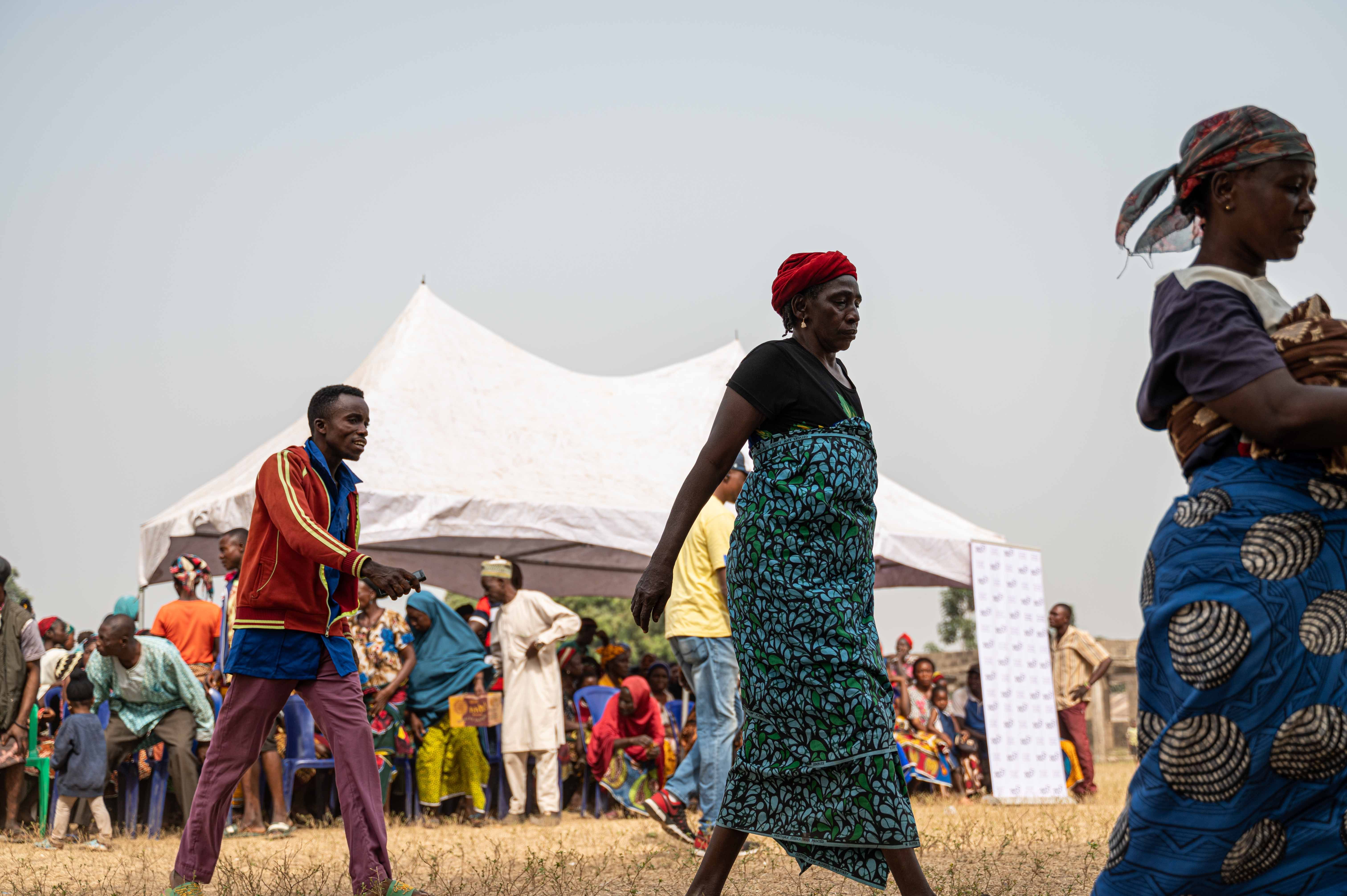 Community members participating during our medical outreach at Usha, where families gathered to receive support, care, and essential health services.