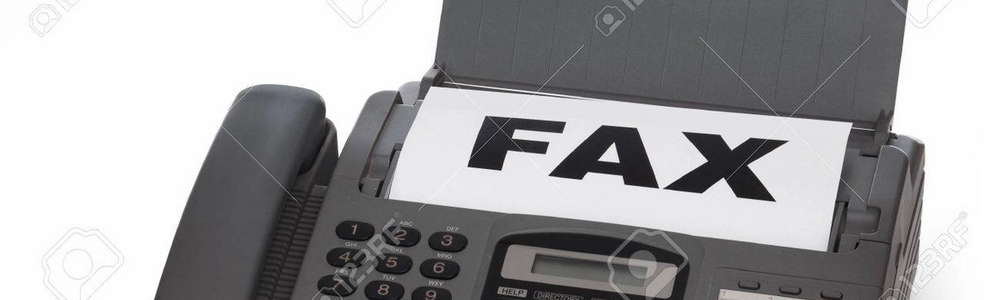 A fax machine printing a piece of paper that says "FAX".