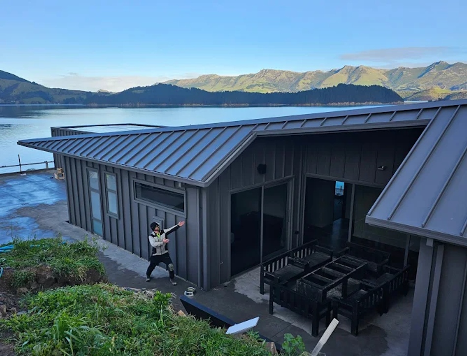 Modern long-run metal spouting installed with clean lines to suit this contemporary home.