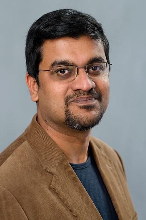 Headshot of Sanjay Kumar.