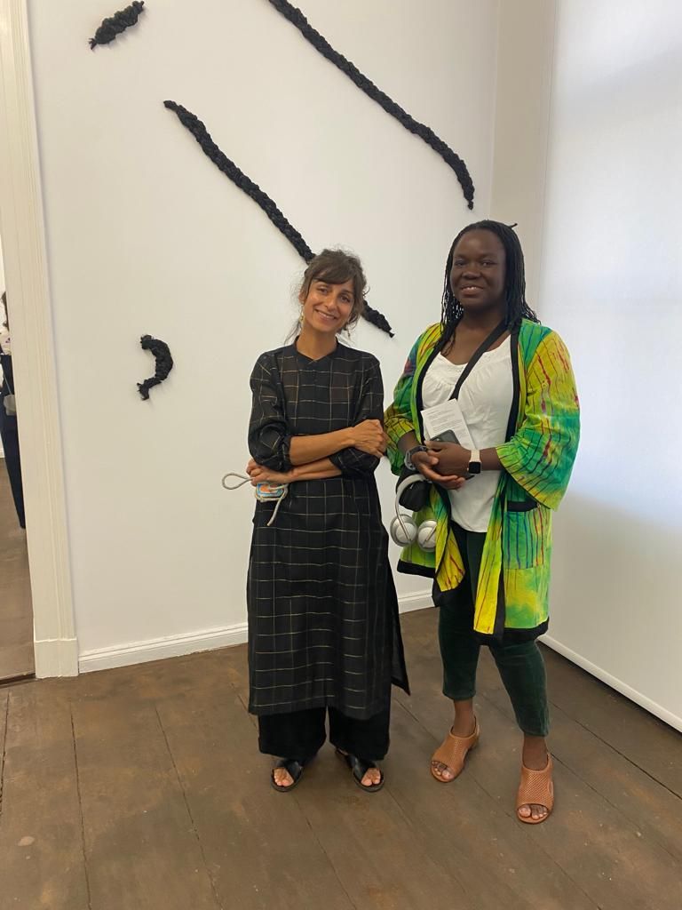Jeanno Gaussi and Nnenna Onuoha in front of Nnenna's work.