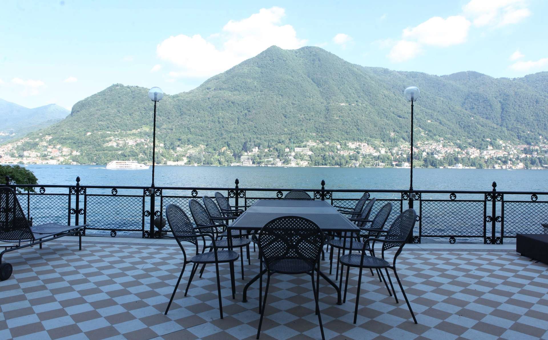Terrace overlooking Lake Como. An example of luxury villa rentals in Italy