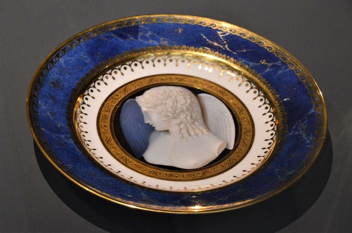plate from a porcelain collection. A rather common style of collection.