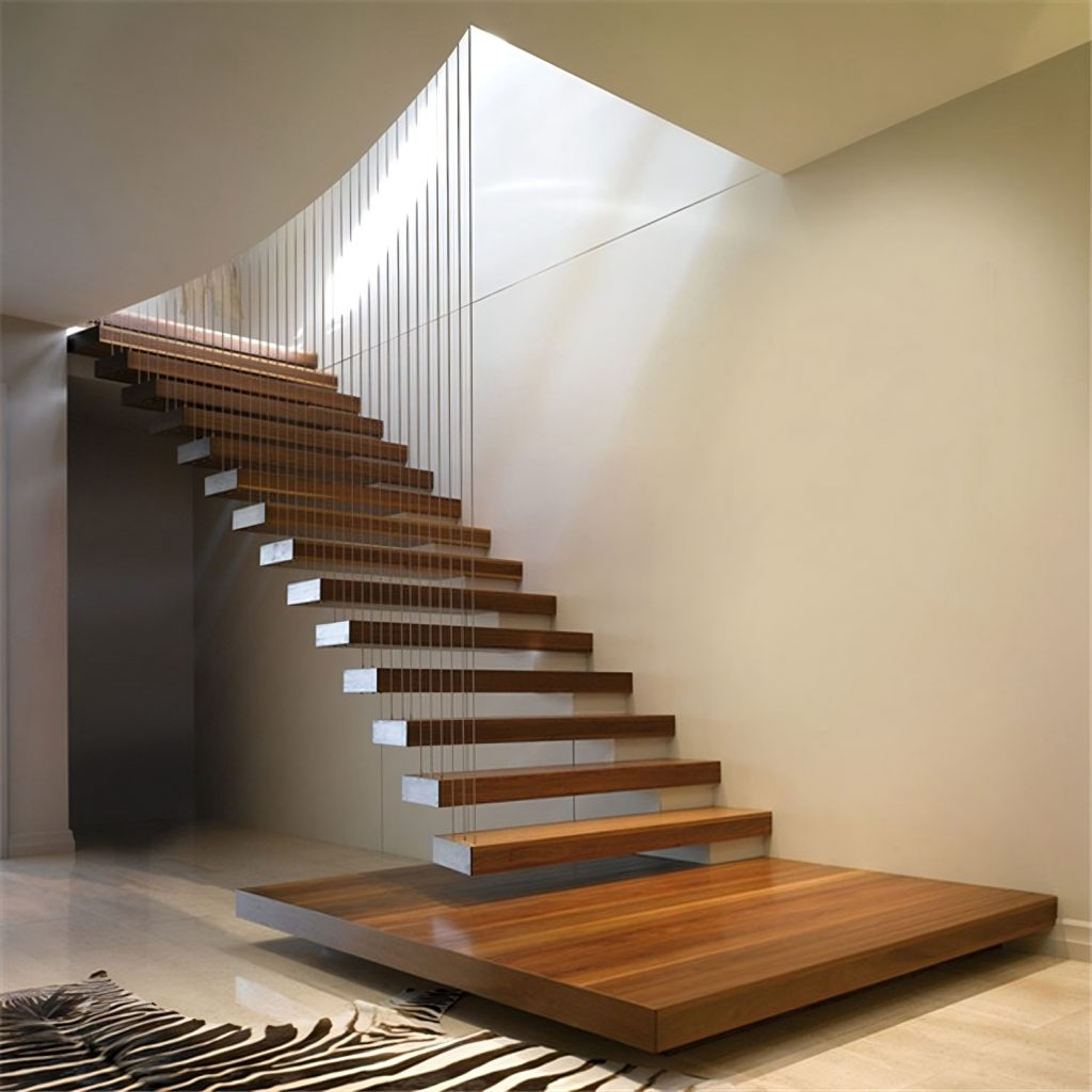 Floating staircase with open treads in a modern London interior
