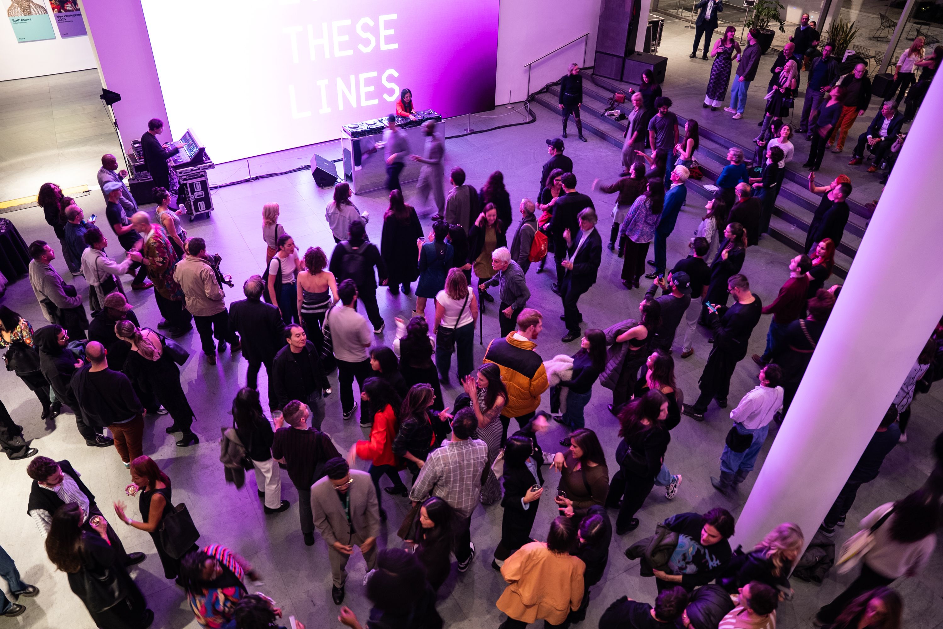 A crowd dancing in the Museum lobby