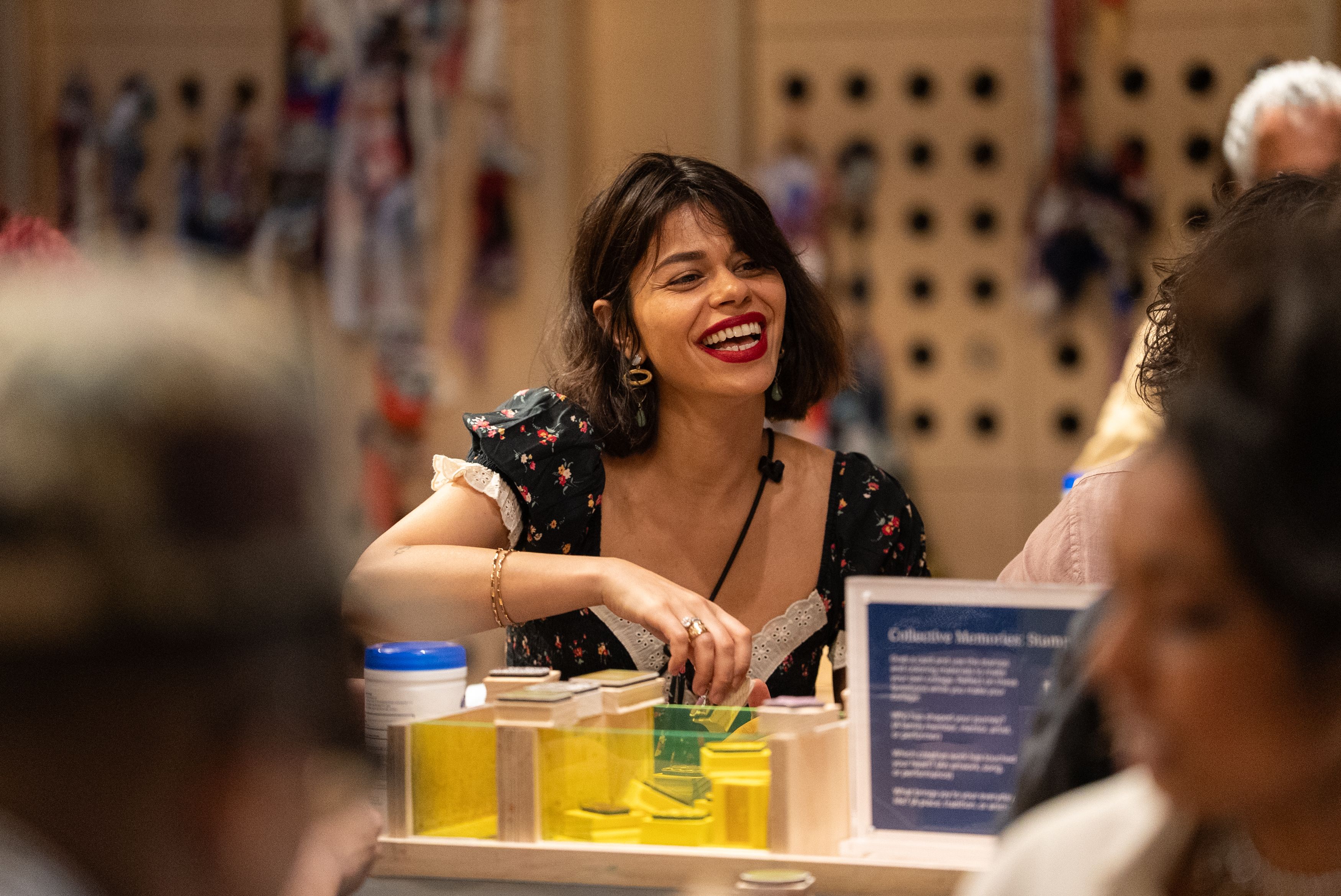 Woman smiling and doing crafts