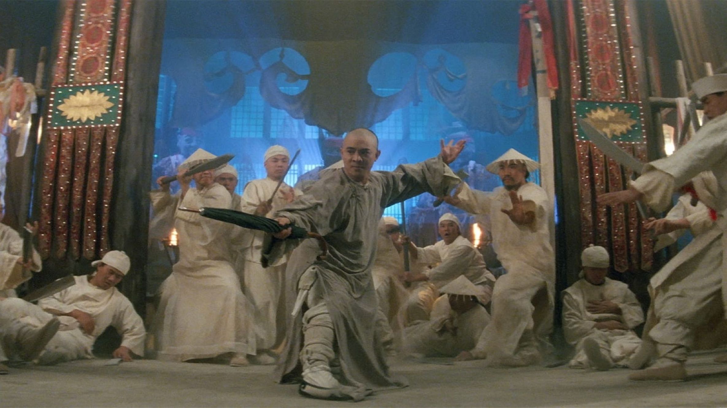 Man fighting against other men in white