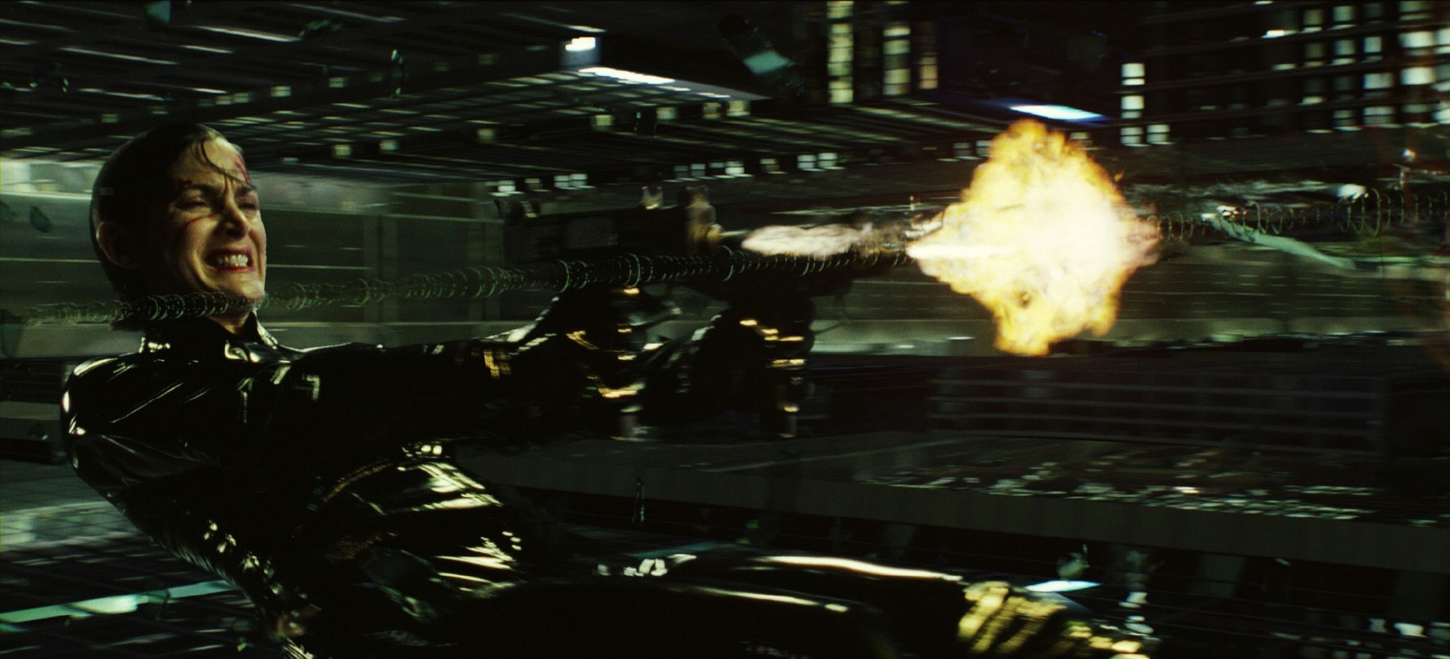 Woman firing a gun on black clothes