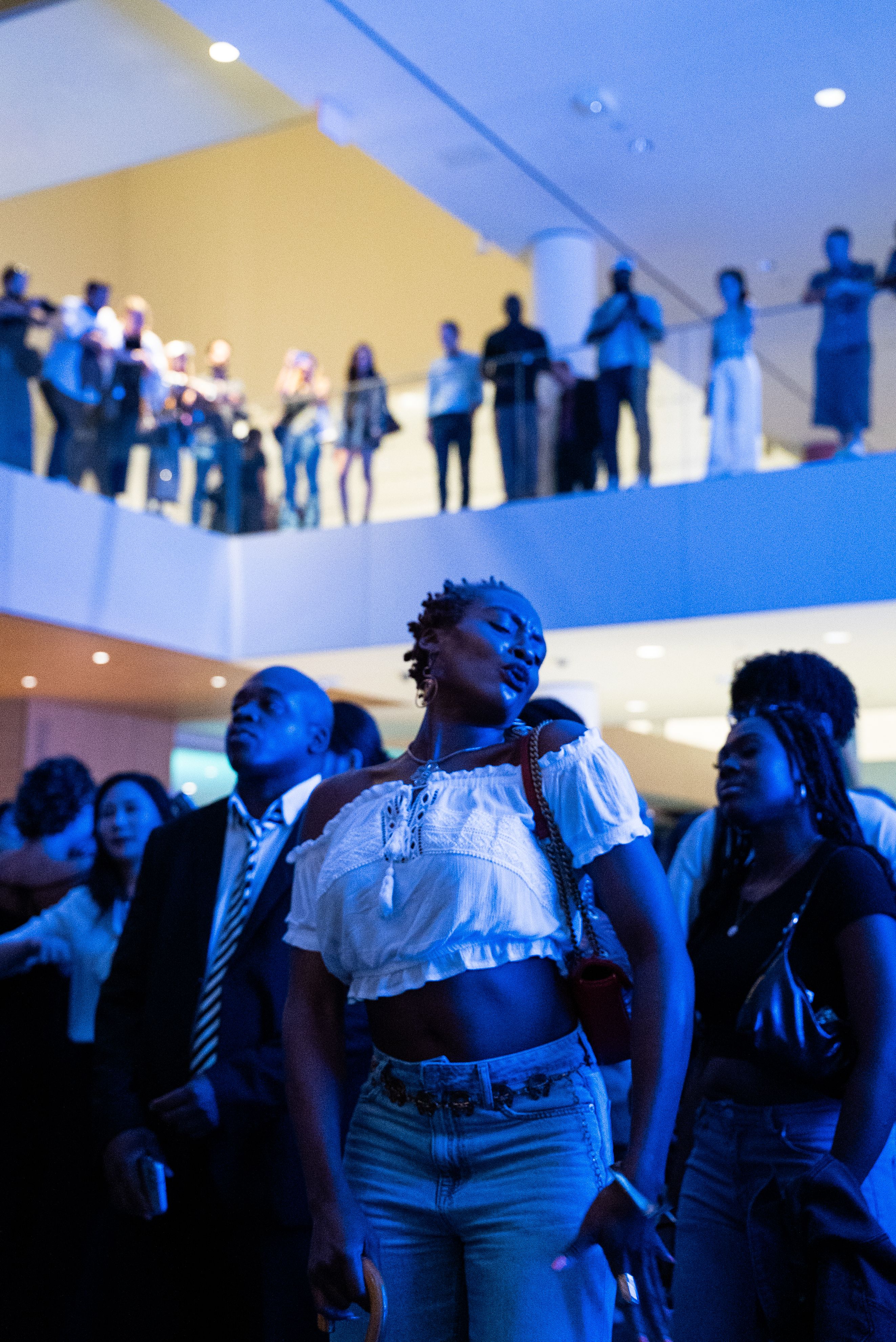 Woman dancing in a crowded party