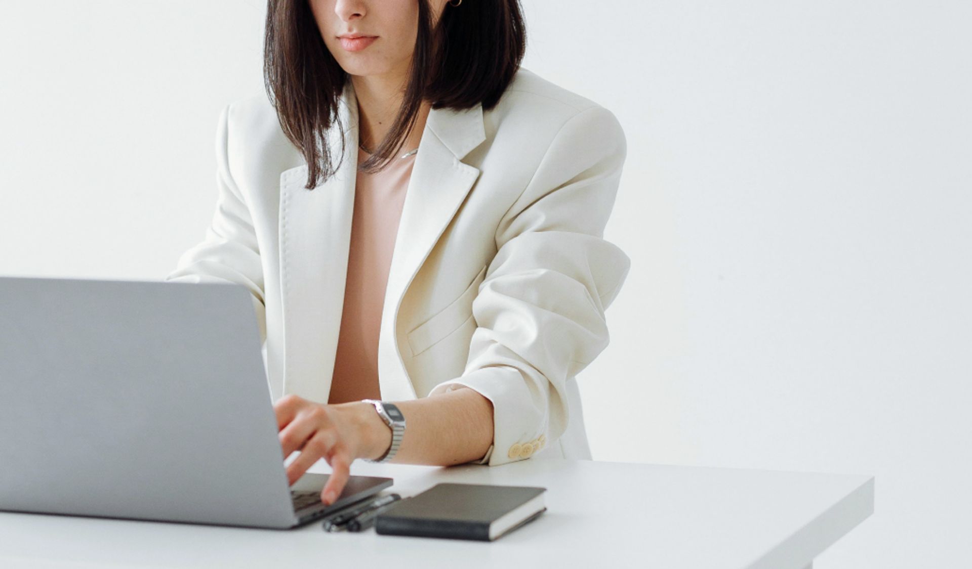 Woman sitting in front of a computer