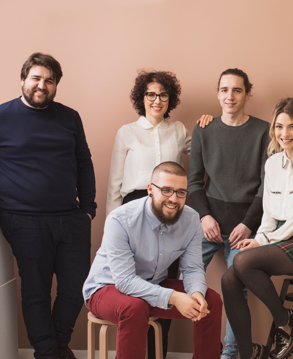 Founding team at startup looking excited.