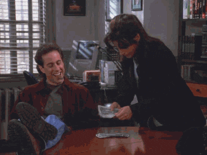 Jerry Seinfeld smoking a cigar getting money from Elaine