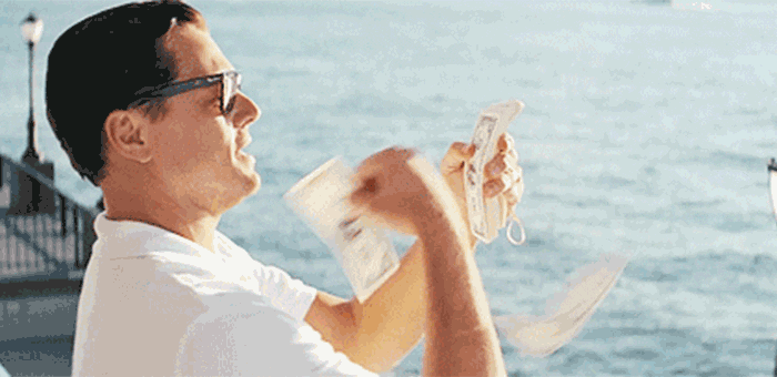 Leonardo Dicaprio throwing money gif from Wolf of Wall Street