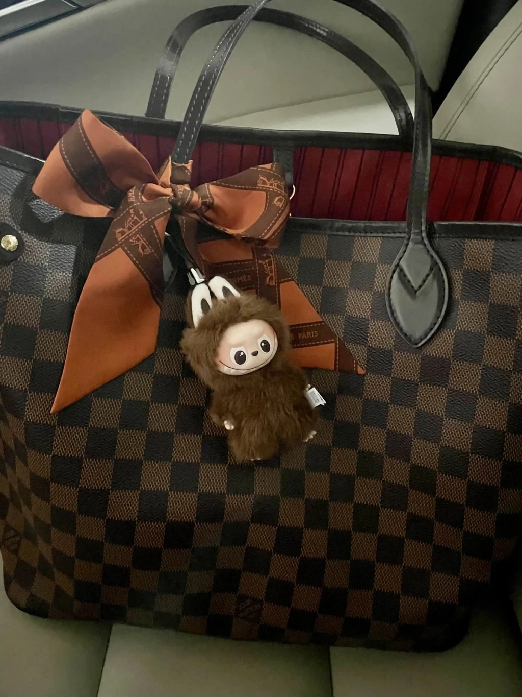 “At first I wasn’t in love with this line but they have now really grown on me! I have small crossbodies for running around on the weekends and they are the perfect size!”