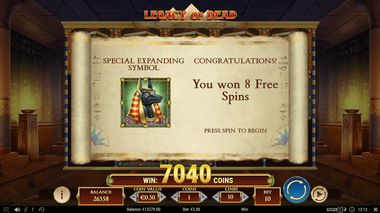 Legacy of Dead slot game showing the free spins feature with 8 free spins awarded and a random expanding symbol selected for the bonus round.