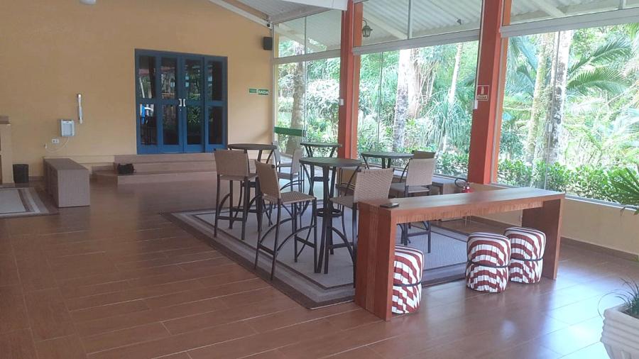 Sala de convívio do Matiz Igaratá Resort — detalhe do ambiente