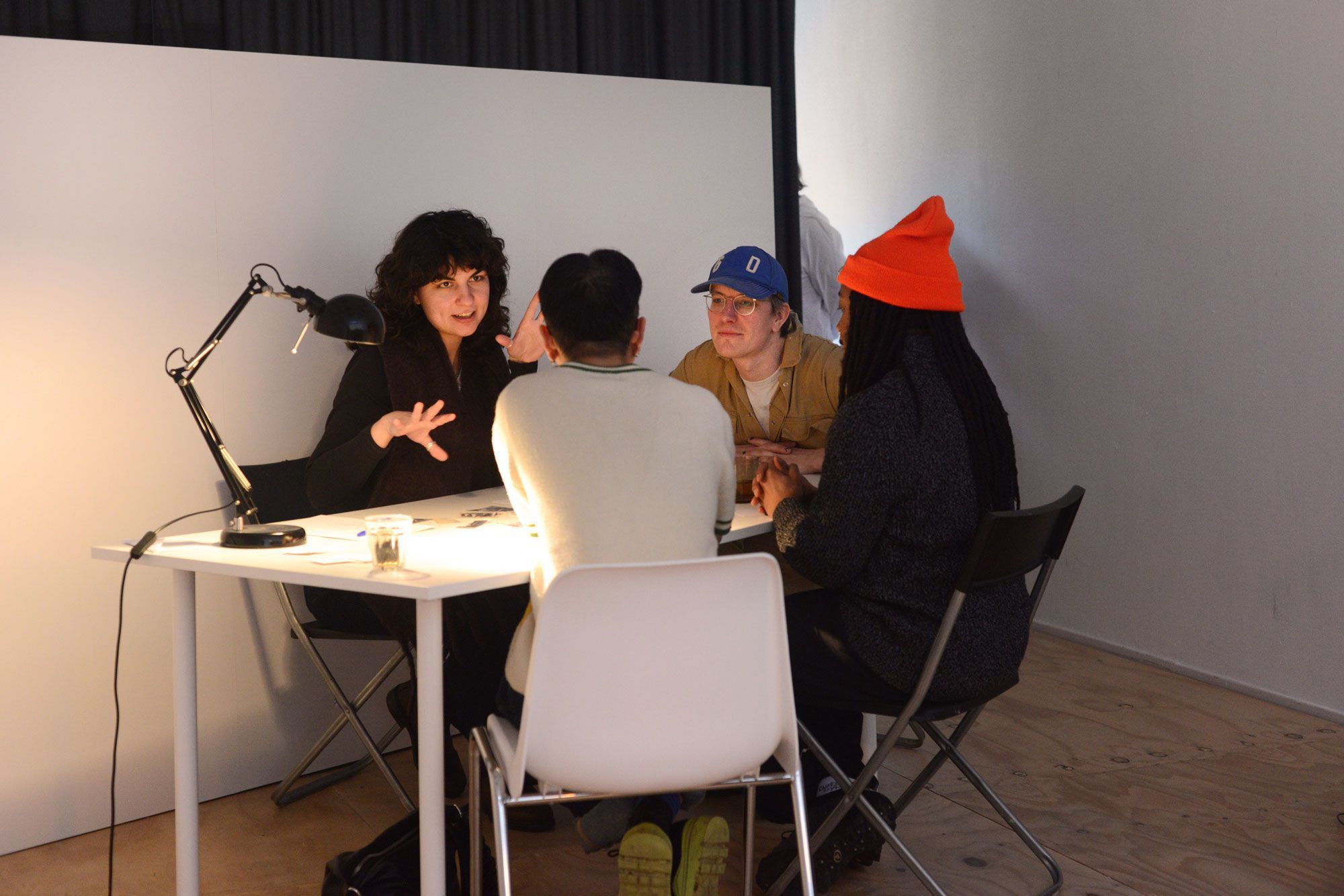 people playing a game at the table