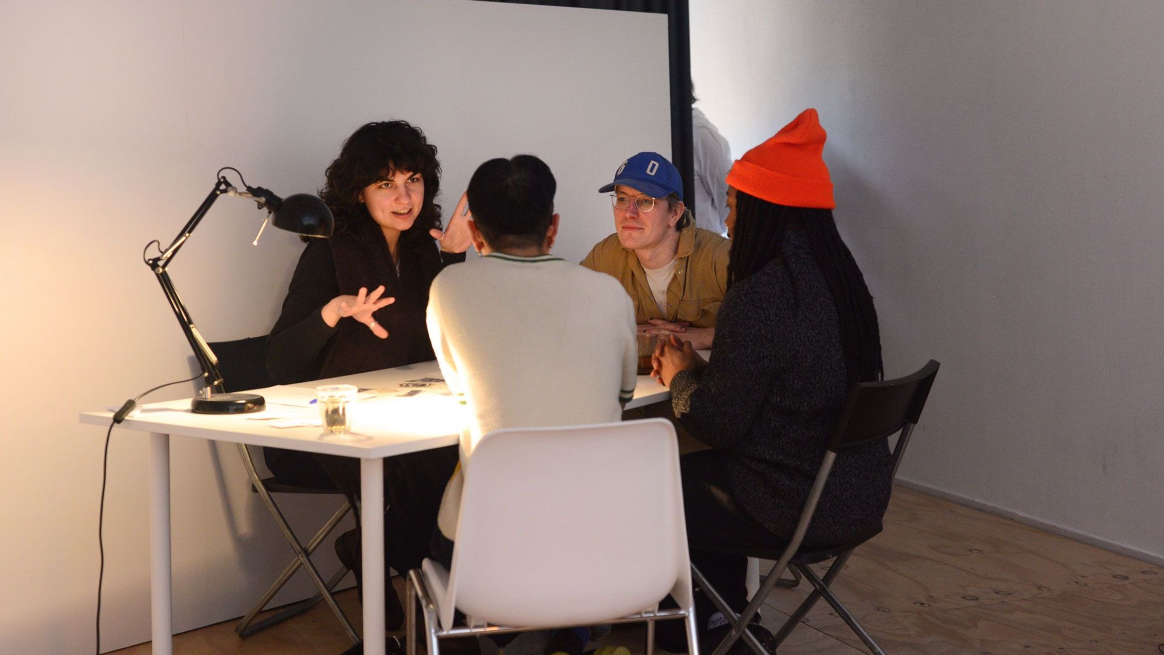people playing a game at the table