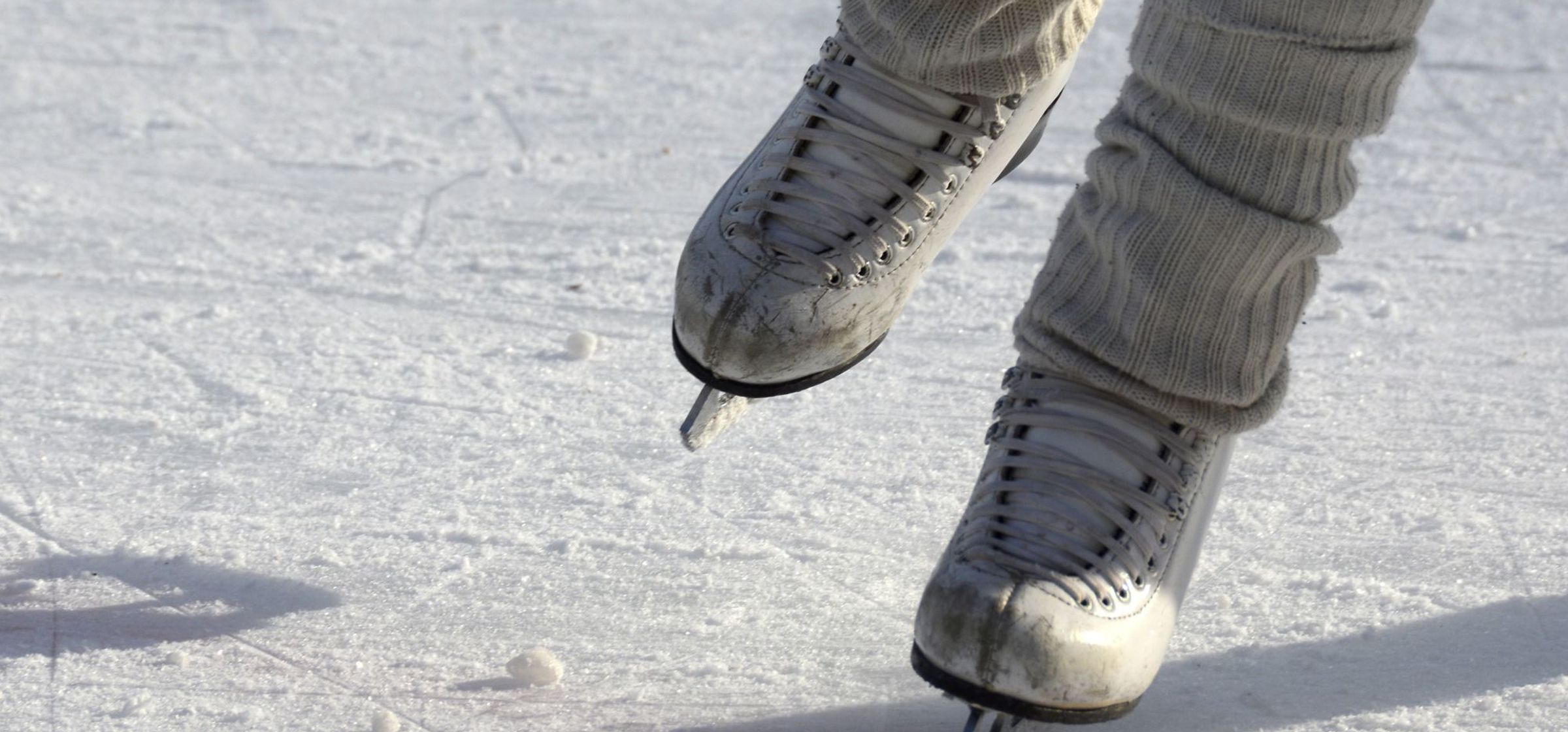 A pair of skates on ice.