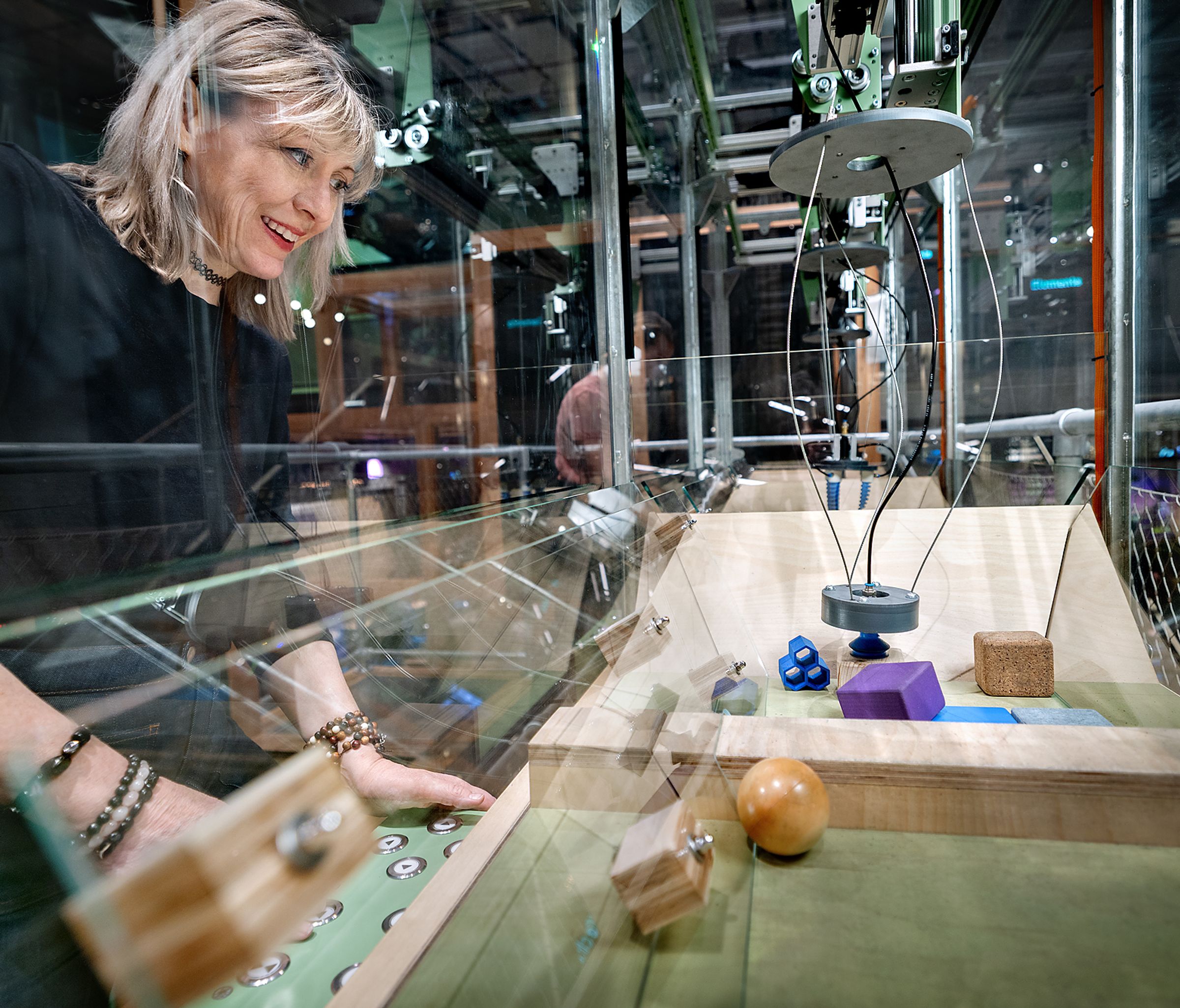 a woman playing with the machine