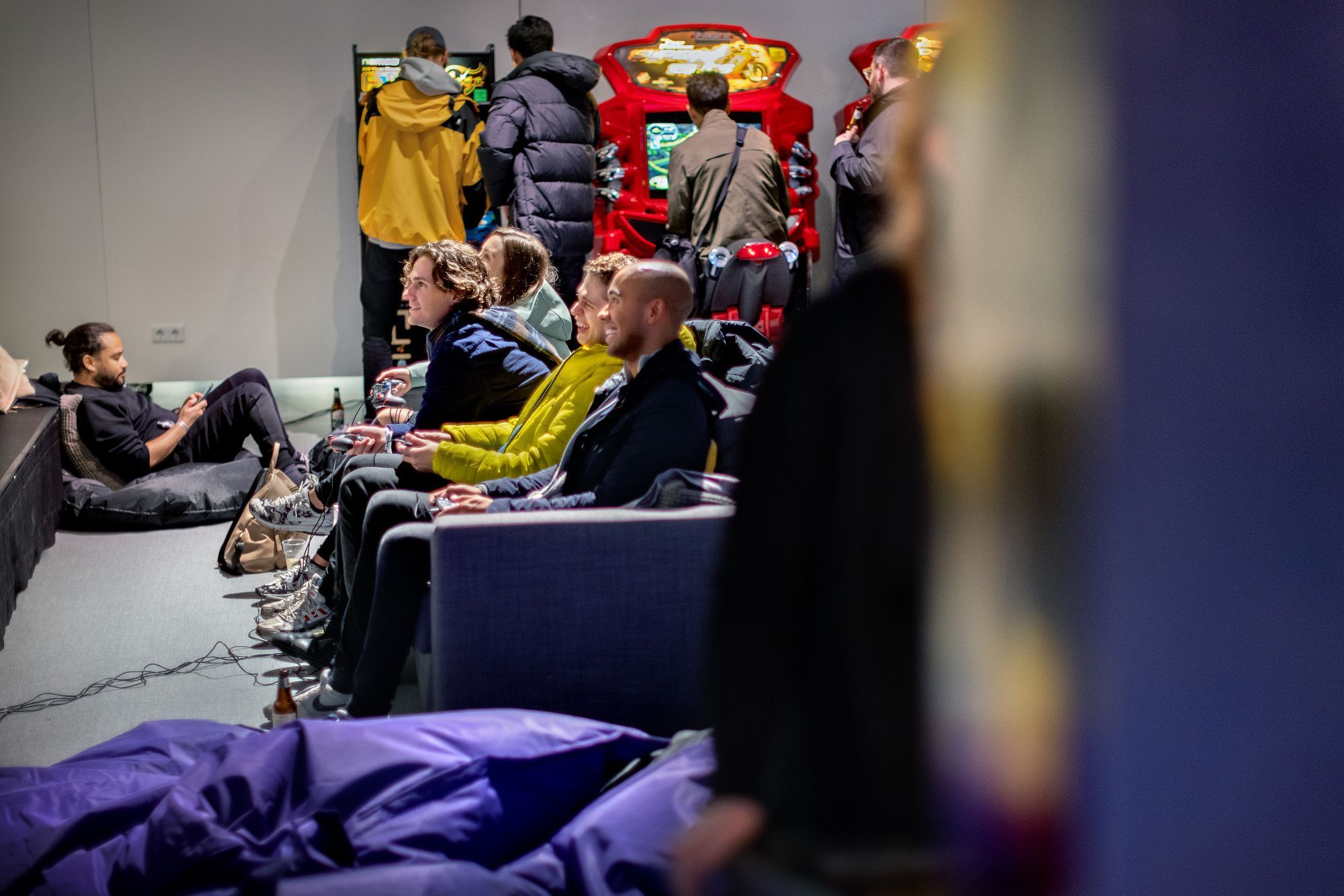 people gaming together on a couch