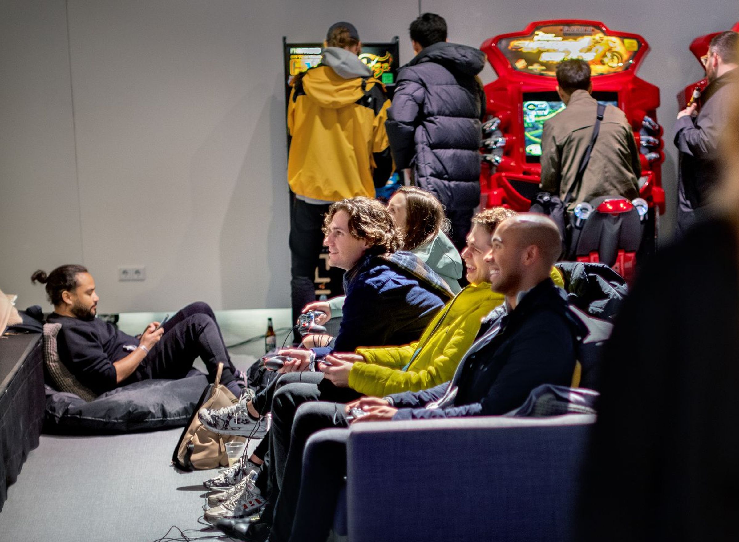 people gaming together on a couch