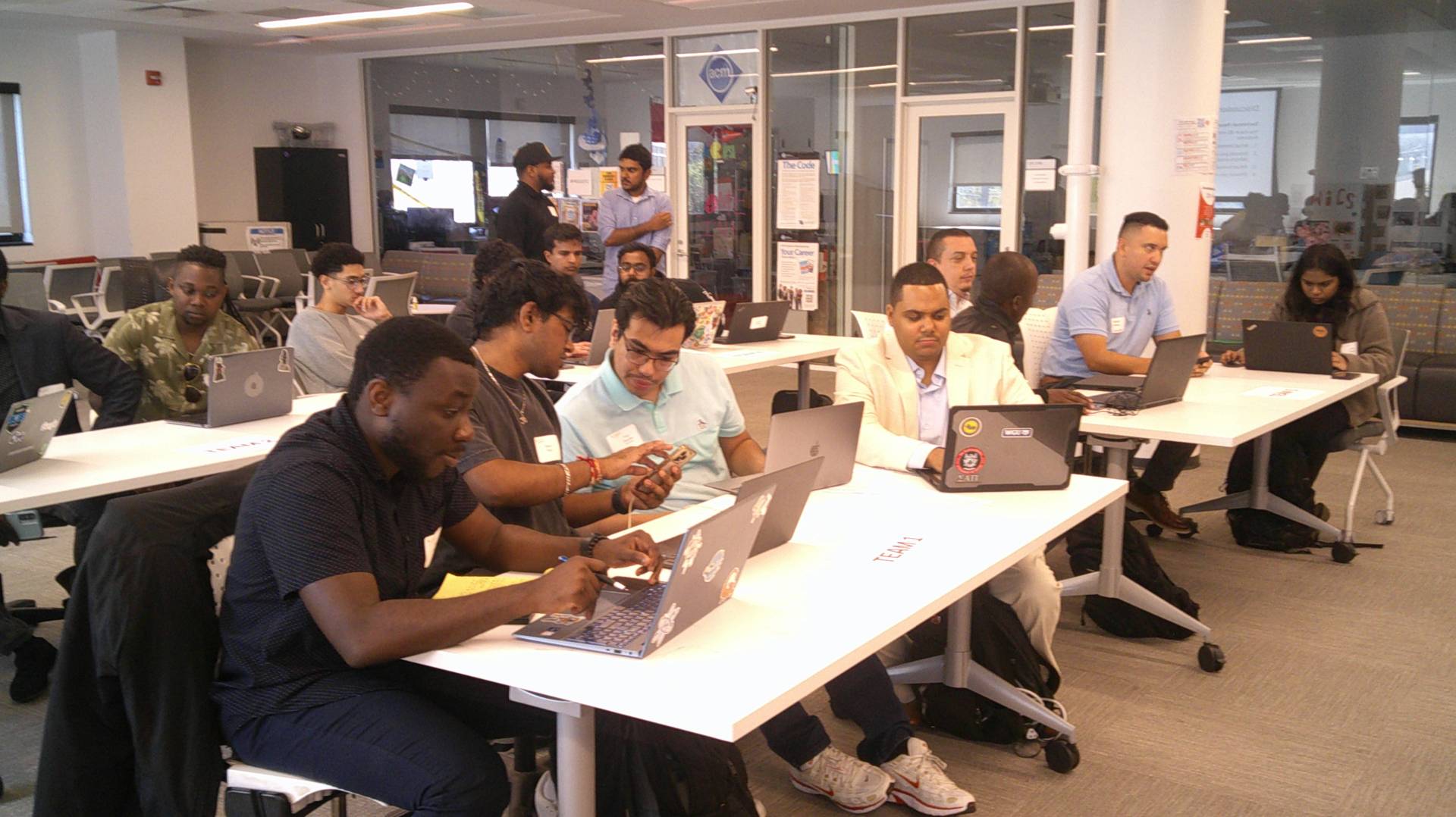 YWCC Capstone student teams collaborating on projects in a classroom setting